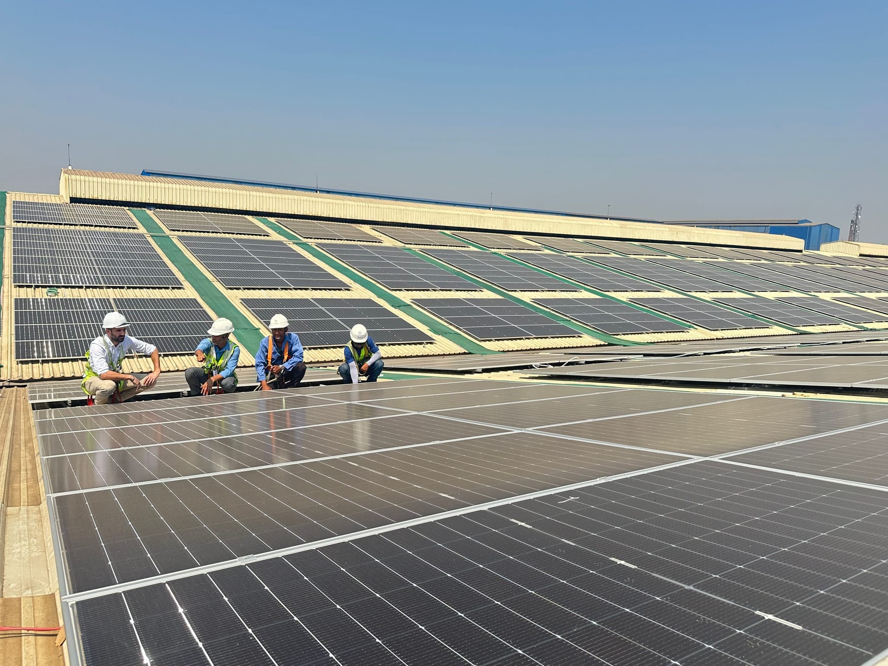 Solar Age engineers on a commercial rooftop installation in Myanmar